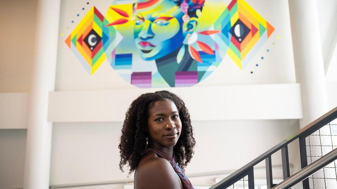 Local muralist and artist Georgie Nakima creates a commissioned a mural titles “Earth Keeper” at the Harvey B. Gantt Center for African-American Arts + Culture. “Creating this project at the Harvey B. Gantt Center is a full circle moment moment for me, being an artist based in Charlotte and growing up in Charlotte,” says Nakima.