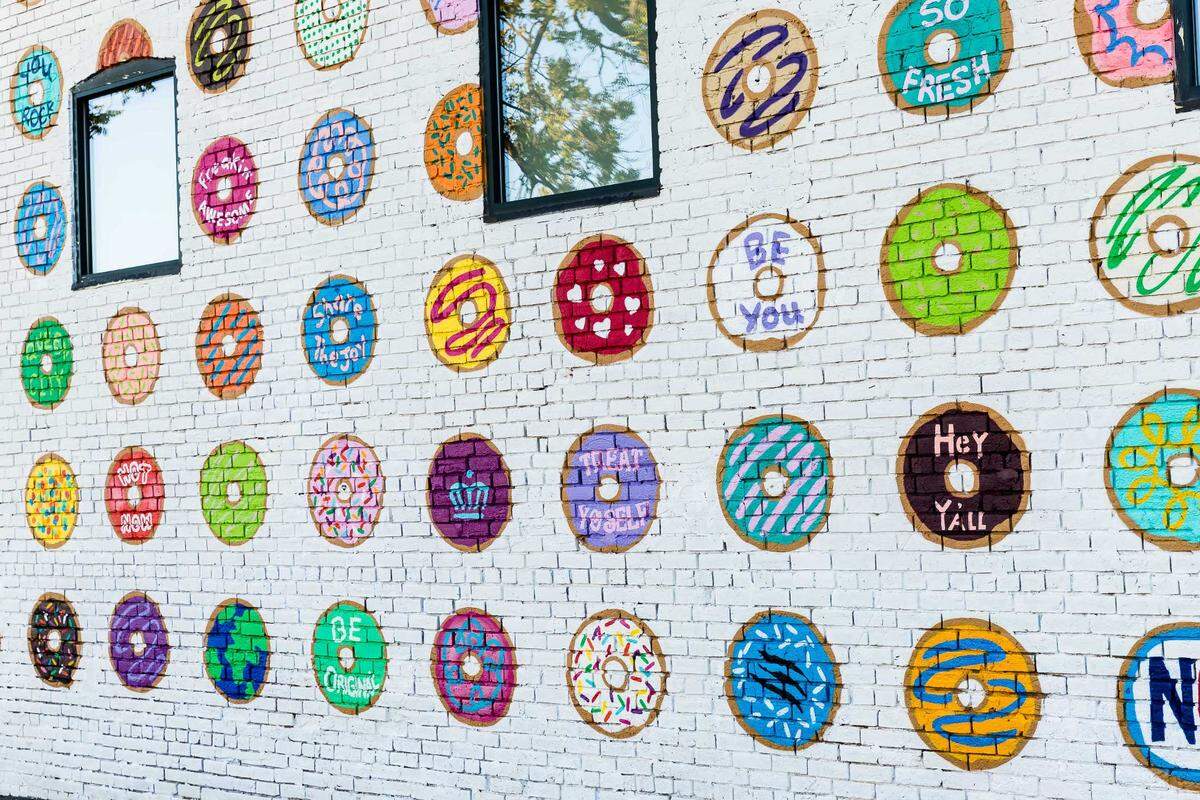 If the smell of fresh dessert didn’t draw you in, two doughnut-themed murals by Gina Elizabeth Franco may just do the trick.
