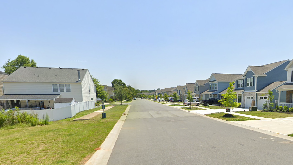 A 12-year-old died and a 15-year-old was injured in a shootout Saturday on this residential street in Monroe, N.C.