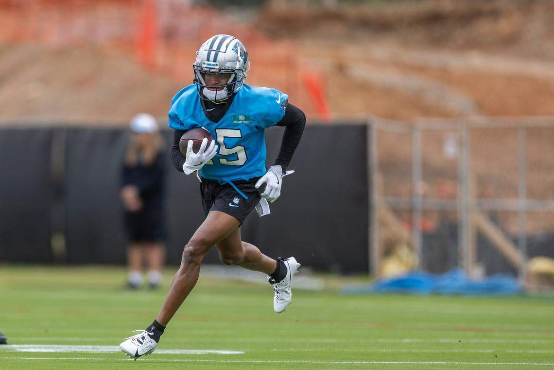 Carolina Panthers Jimmy Horn Jr. runs with the ball during the Carolina Panthers rookie minicamp in Charlotte on Saturday, May 10, 2025.