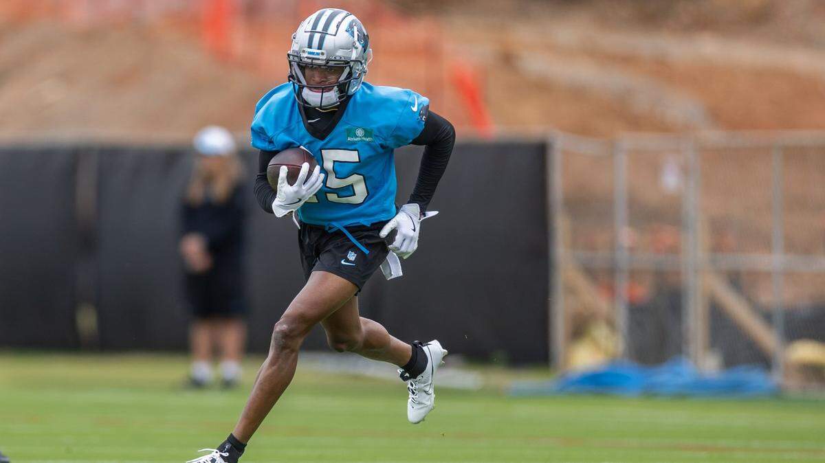 Carolina Panthers Jimmy Horn Jr. runs with the ball during the Carolina Panthers rookie minicamp in Charlotte on Saturday, May 10, 2025.