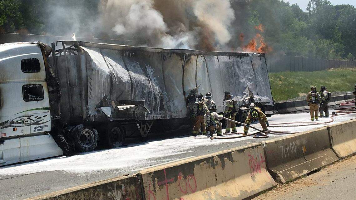 A large fire involving a tractor-trailer shut down a portion of Interstate 77 in north Charlotte Friday afternoon.