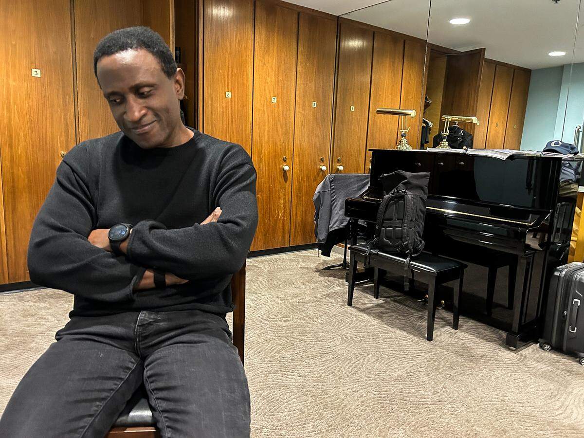 Charlotte Symphony music director Kwamé Ryan, in a reflective moment in his Met Opera dressing room ahead of conducting “Porgy and Bess” for his Met debut. This is before the final show, Jan. 24, 2026.