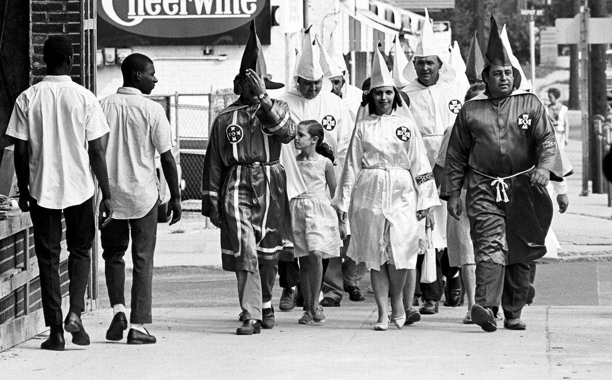 Ku Klux Klan members on a Salisbury street in 1964.