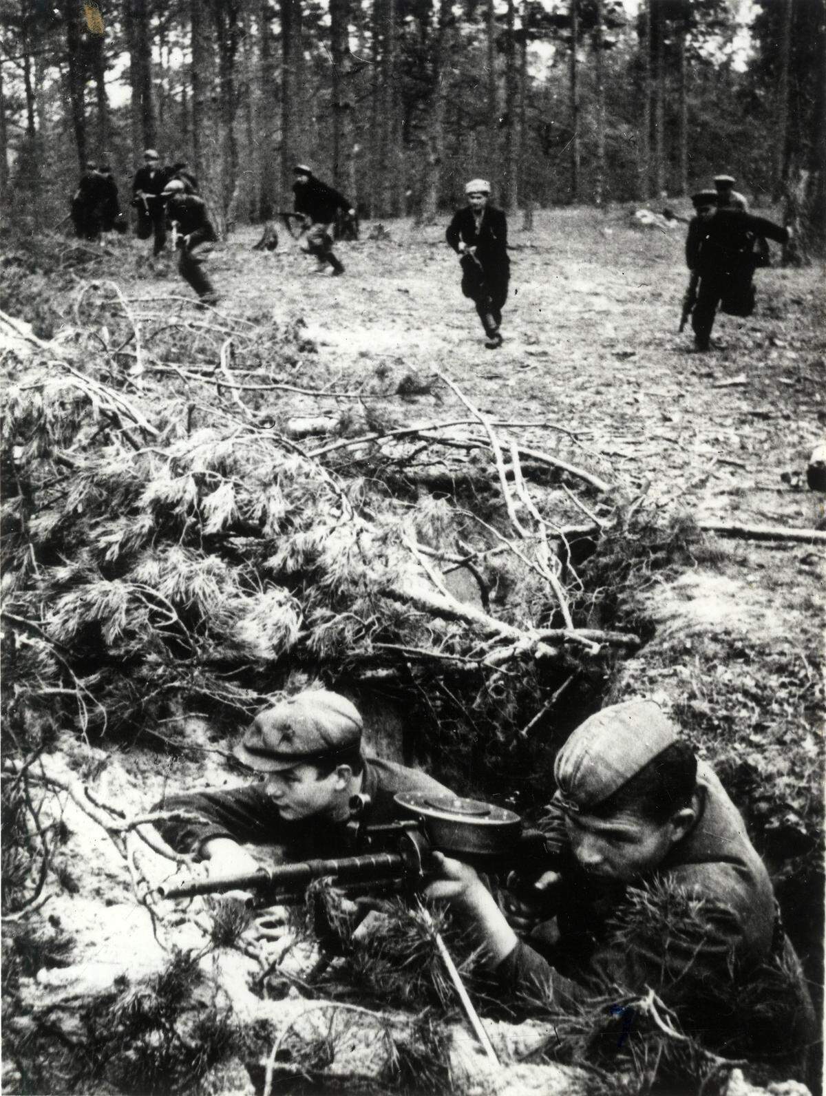 A partisan unit during a WWII assault.