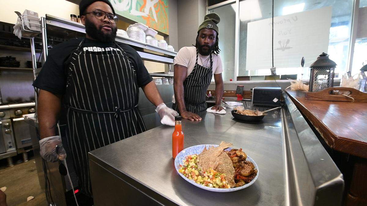 Chefs Daryl Cooper and Oscar Johnson of Jimmy Pearls restaurant in Charlotte share their Virginia-style fried croaker and potatoes with pickled succotash.