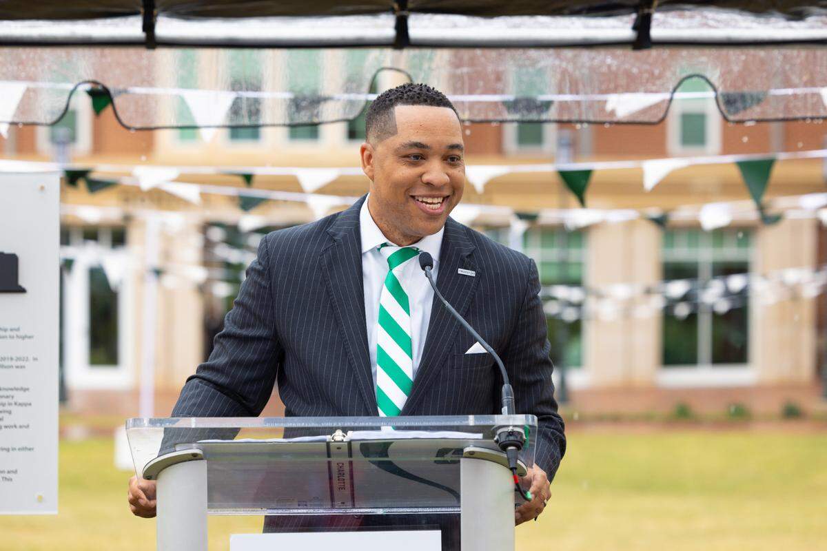 Dontá L. Wilson, an alumnus and Truist banker speaking during an UNCC ceremony naming a residence hall in his honor, now called Wilson Hall.