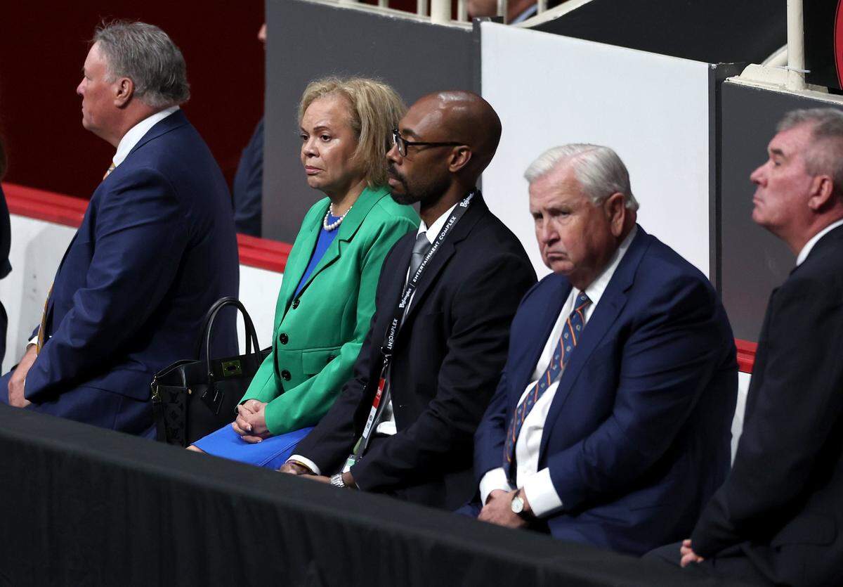 Charlotte Mayor Vi Lyles, second from left, listens intently during a memorial service for U.S. Marshal Thomas Weeks Jr. at Bojangles Coliseum in Charlotte, NC on Monday, May 6, 2024. U.S. Marshal Thomas Weeks Jr., died during a standoff with a gunman on Monday, April 29th 2024. Two other law enforcement officers were also killed in the shootout. CMPD Officer Joshua Eyer passed away later Monday evening from injuries sustained during the shootout.