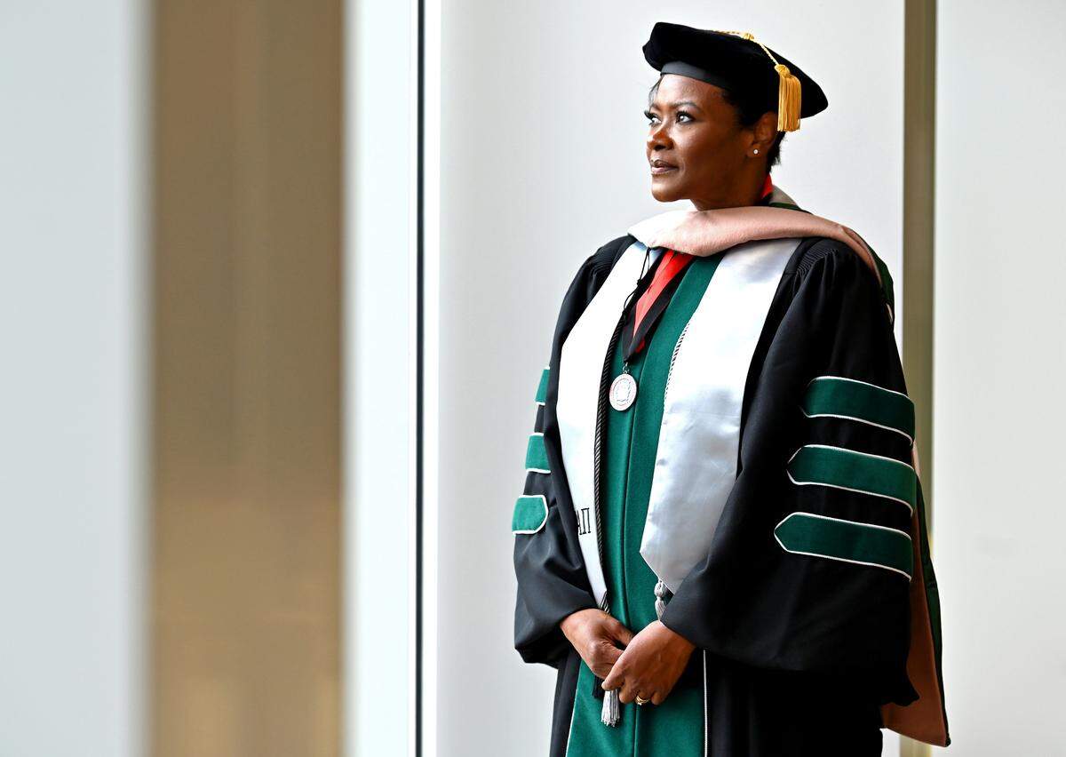 LaShana Wiggs, a UNC Charlotte graduate on Friday, May 13, 2022. In January 2019, LaShana Wiggs’ life was altered. Wiggs, a wife, mother of three, doctoral student and executive at one of Charlotte’s largest employers, suddenly lost vision in her right eye. Visits to multiple doctors and specialists, a battery of tests, a three-day stay in the ER and a misdiagnosis eventually led to a conclusive answer for her issues. Wiggs was diagnosed with multiple sclerosis. Wiggs is graduated on Friday, May 13, 2022 with a doctorate and is the commencement speaker.