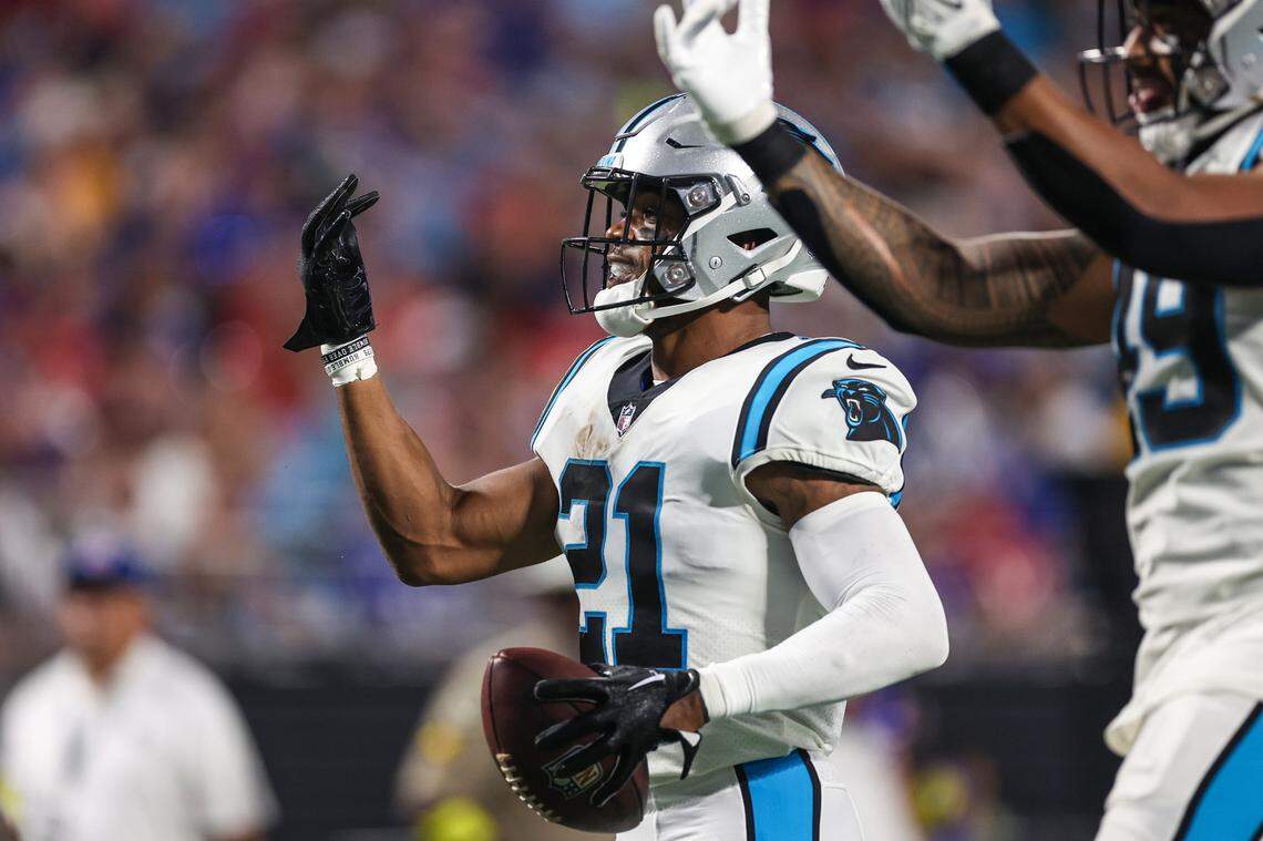 Panthers safety Jeremy Chinn gestures toward the stands after an interception during the game against the Bills at Bank of America Stadium on Friday, August 26, 2022 in Charlotte, NC.