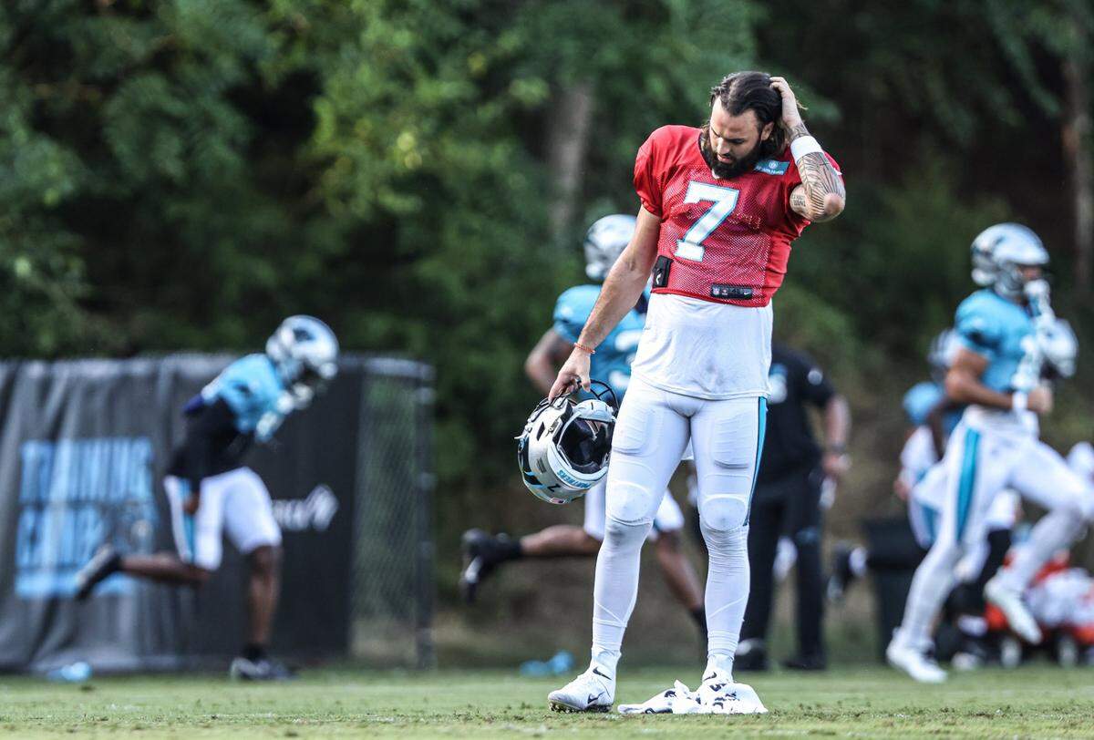 Carolina Panthers Will Grier runs his fingers through his hair during the joint practice with the Baltimore Ravens in Spartanburg, S.C., on Thursday, August 19, 2021.