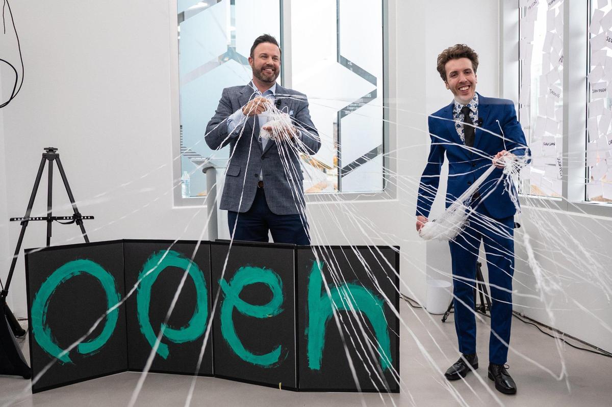 From left, local news anchor Jason Harper and Museum Chief Illusionist Caleb Morgan throw streamers at the grand opening ceremony for Museum of Illusions Charlotte on Tuesday, December 6, 2022. The Charlotte location is the 39th museum, across 25 countries. The public will be able to visit starting Friday, December 9, 2022.