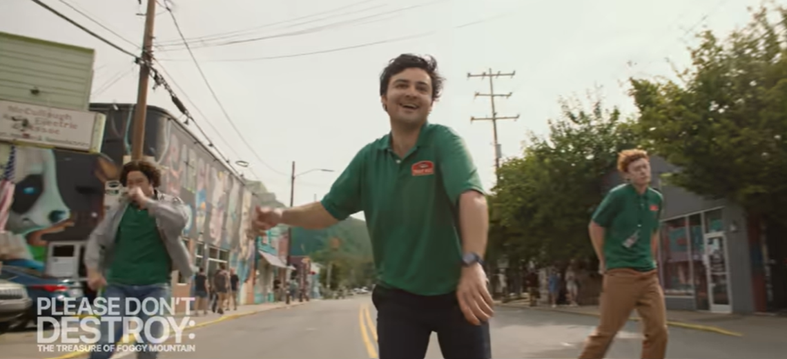 Ben Marshall, John Higgins and Martin Herlihy seen roller skating through NoDa in “Please Don’t Destroy: The Treasure of Foggy Mountain” movie trailer.