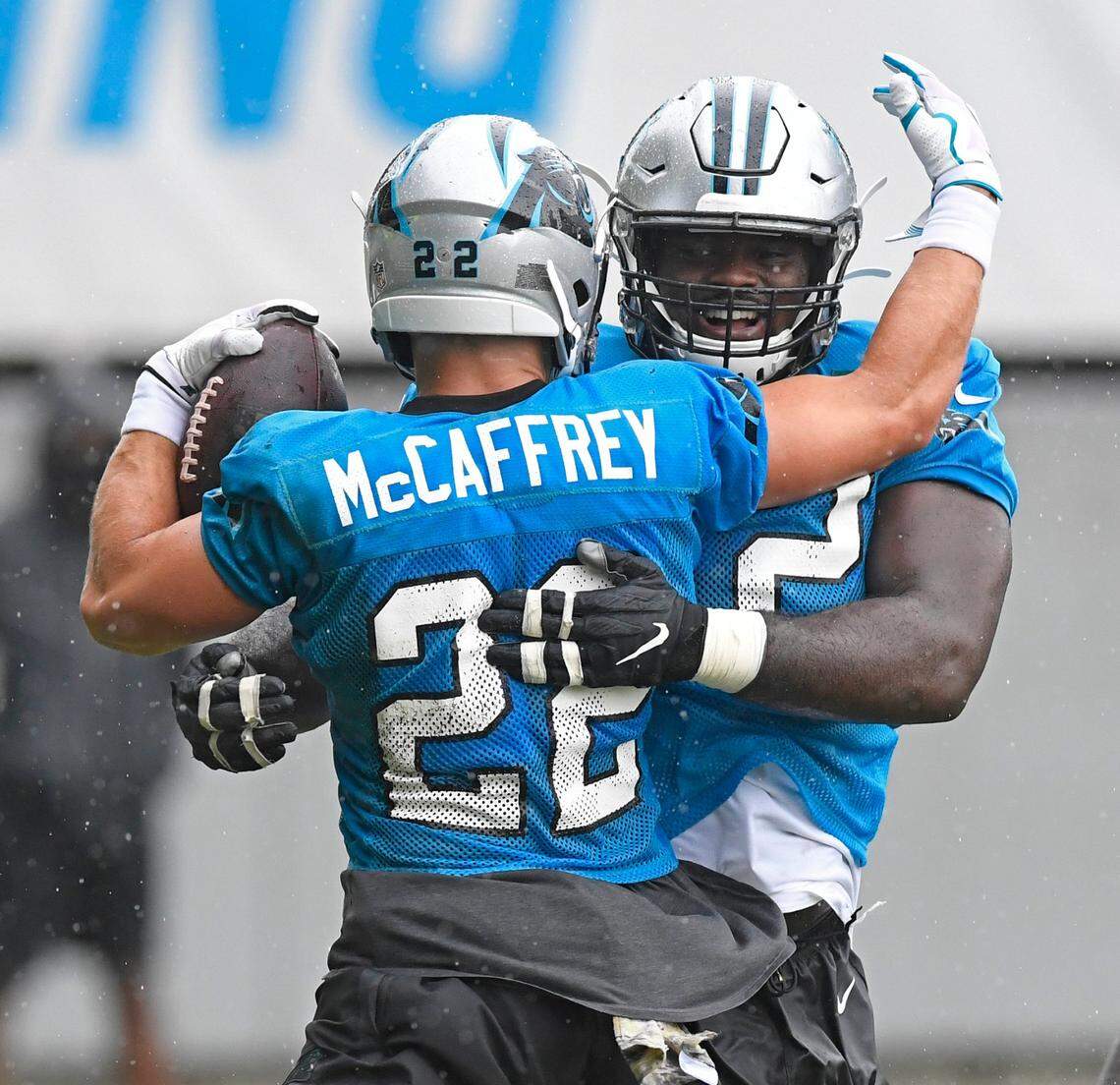 Carolina Panthers tight end Chris Manhertz (82) celebrates a touchdown by running back Christian McCaffrey (22) during practice during training camp at the team’s practice facility on Friday, August 21, 2020.