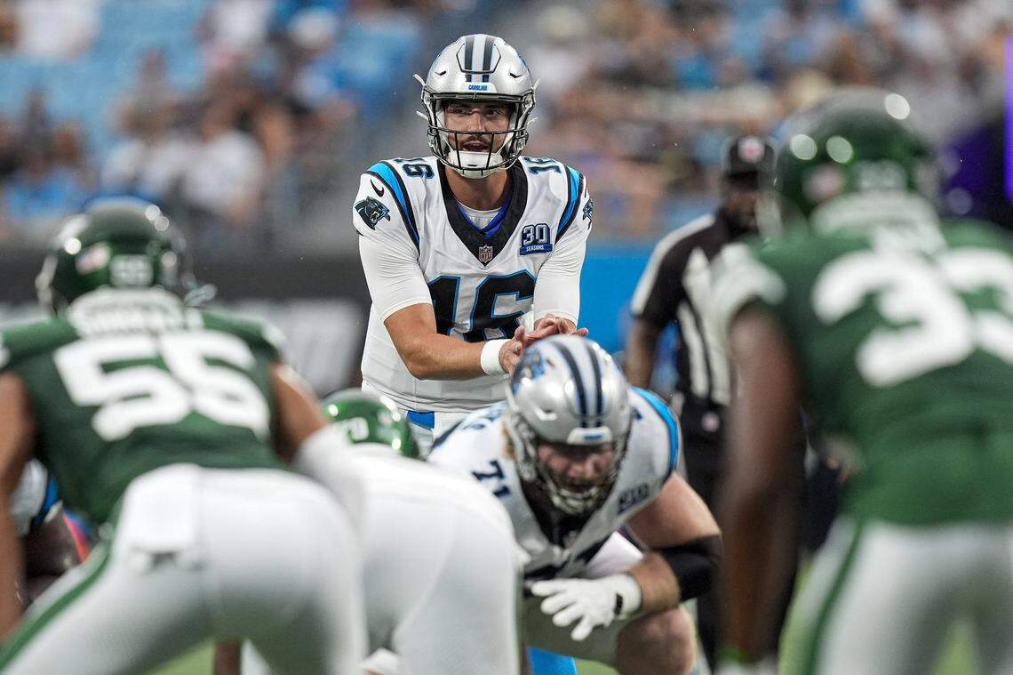 Aug 17, 2024; Charlotte, North Carolina, USA; Carolina Panthers quarterback Jack Plummer (16) takes the snap against the New York Jets during the first quarter at Bank of America Stadium. Mandatory Credit: Jim Dedmon-USA TODAY Sports