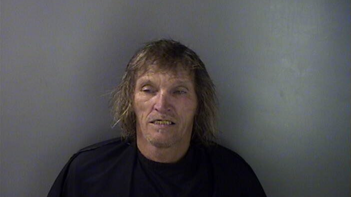 Norman Wightman says snakes forced him to strip off his clothes.