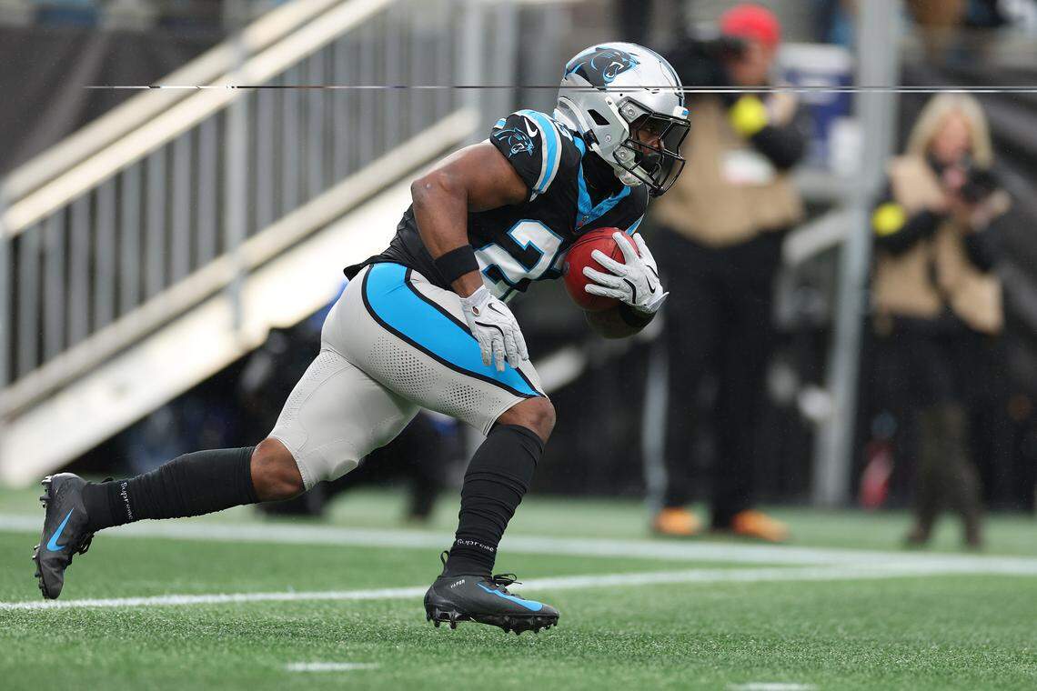 Carolina Panthers running back Trevor Etienne carries the ball against the Los Angeles Rams during Sunday’s second quarter at Bank of America Stadium.