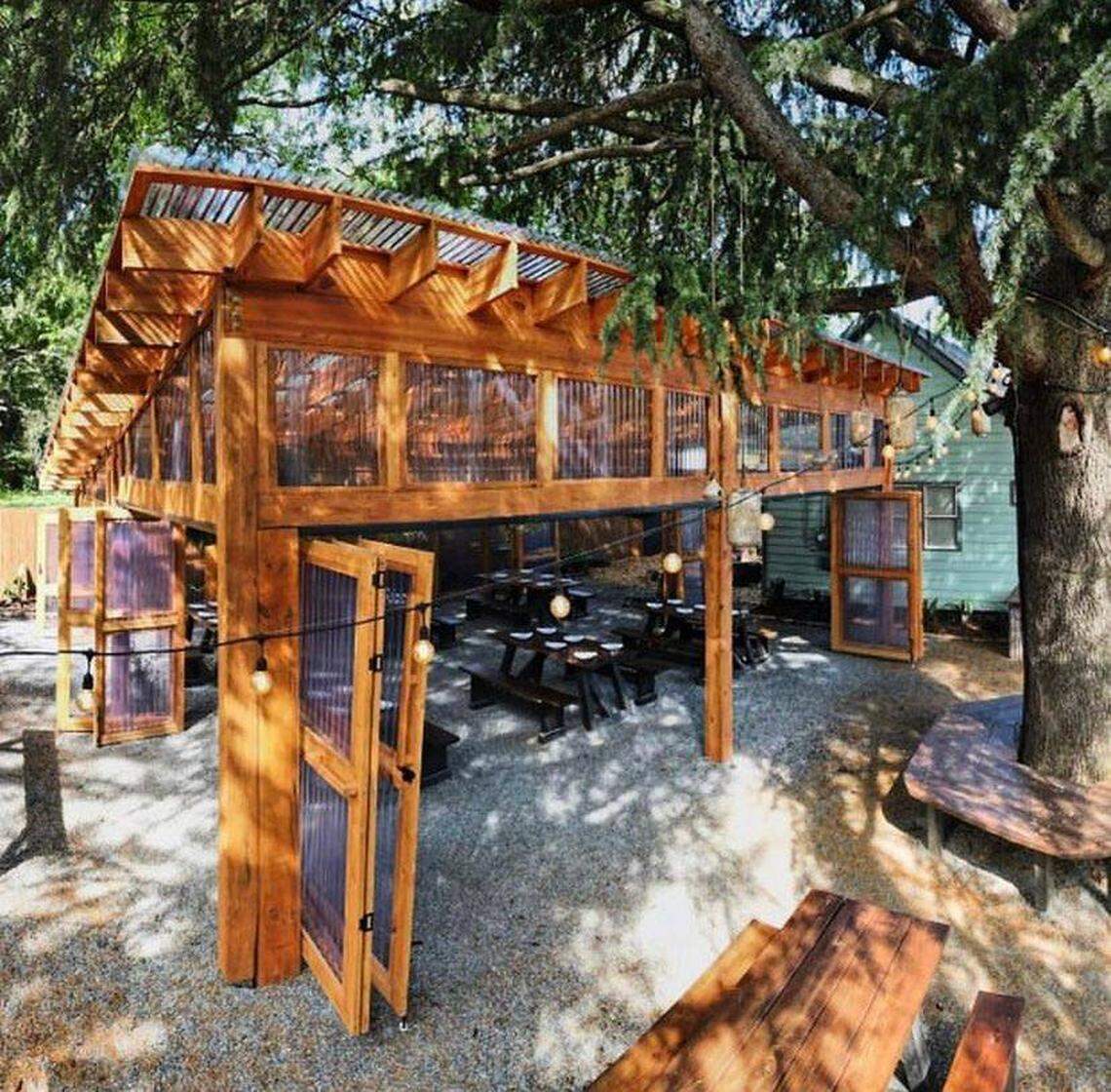 The large pergola on The Goodyear House’s extended patio has heaters and retractable walls.