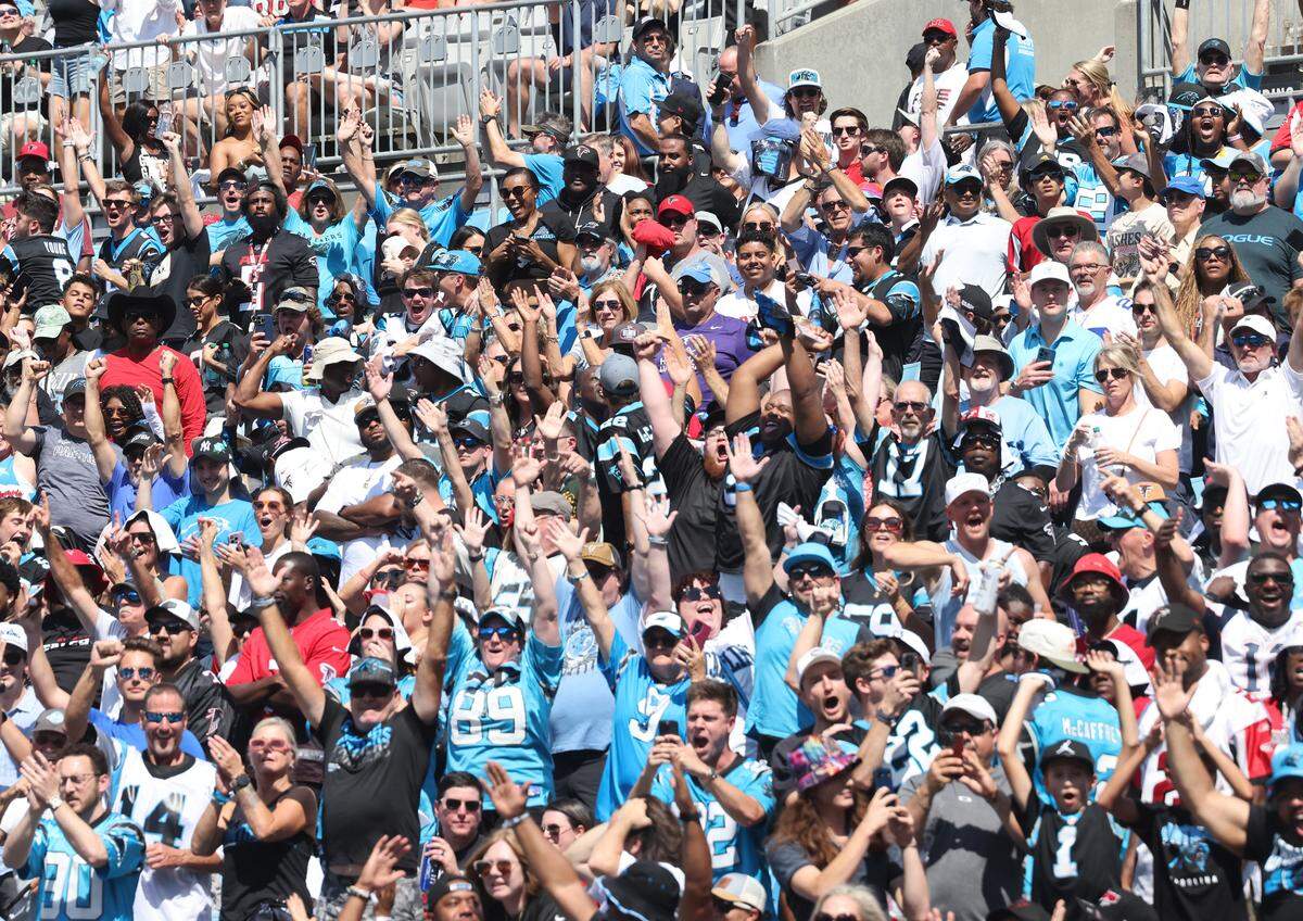 Fans cheer at the Carolina Panthers game against the Atlanta Falcons at the Bank of America Stadium in Charlotte on Sunday, September 21, 2025.