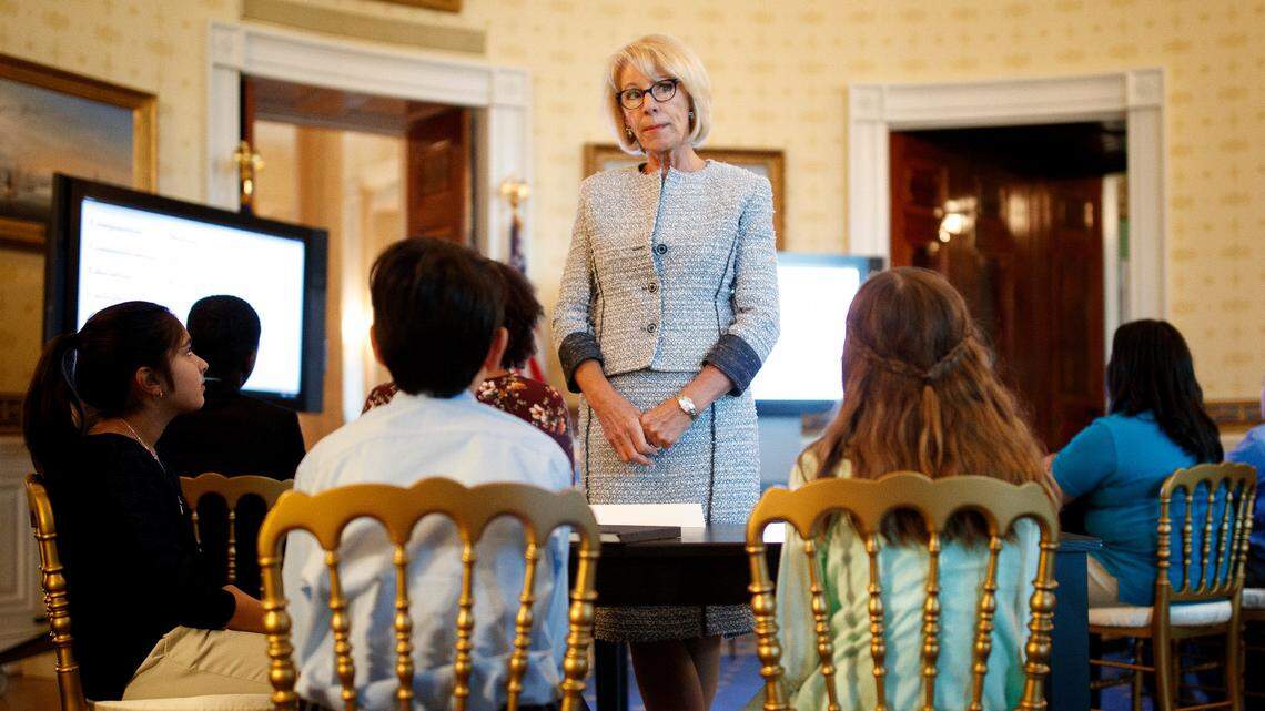 Education Secretary Betsy DeVos speaks to students during a listening session on school issues at the White House in April. The Education Department is considering whether to allow states to use federal funding to purchase guns for educators, according to multiple people with knowledge of the plan.