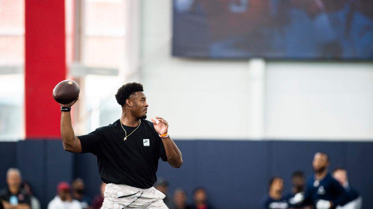 Liberty quarterback Malik Willis runs through passing drills during Liberty Football Pro Day in Lynchburg, Va., on Tuesday, March 22, 2022. (AP Photo/Kendall Warner)