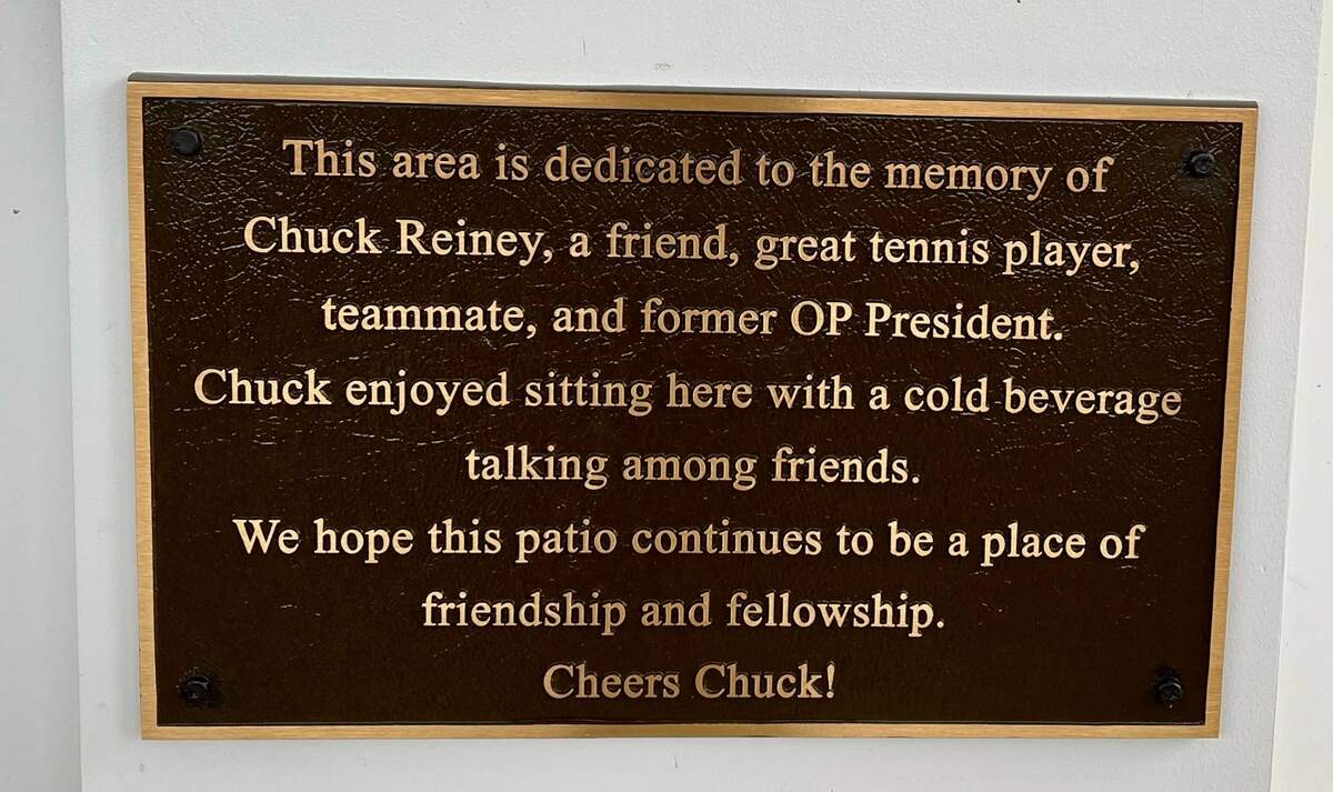 A plaque at the clubhouse of Olde Providence Racquet Club commemorates the life of former club president Chuck Reiney.