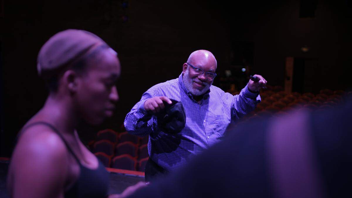 In this 2019 photo, Corey Mitchell offers guidance during a rehearsal for Theatre Charlotte’s “Ain’t Misbehavin,’” which he directed.