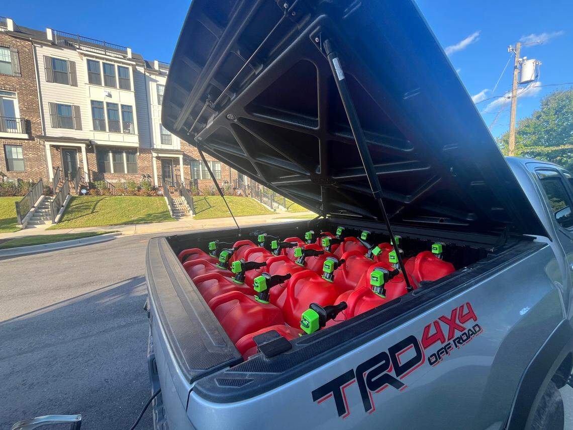 Porter Watson, Shane Shields and friends gathered packed 8x10 trailers and SUVs stuffed with loaded gas canisters, water, diapers and essential supplies to bring back to Asheville and nearby towns in need after Hurricane Helene.