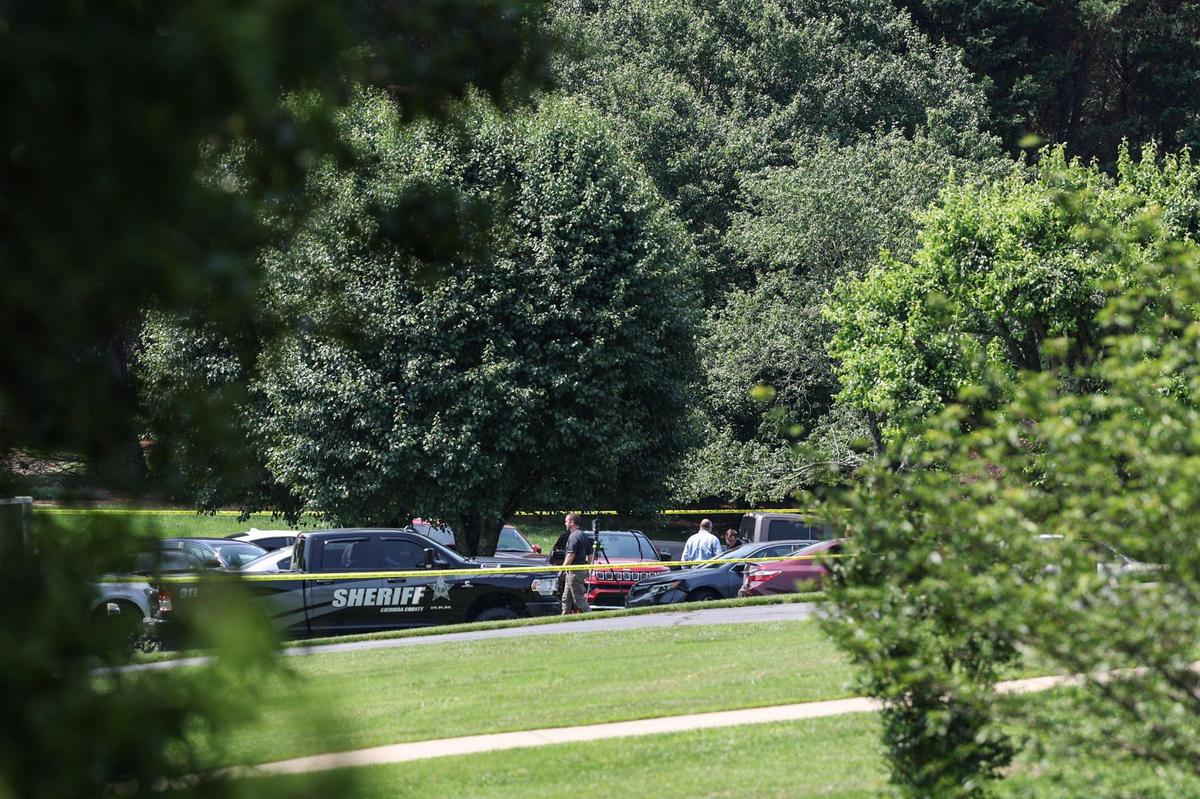 Catawba County Sheriffs investigate the scene of a shooting in the Walnut Acres community in Mountain View on Monday June 2, 2025. Sunday night 80 shots were fired during a mass shooting at a party outside Hickory killing 1, unjuring 11.