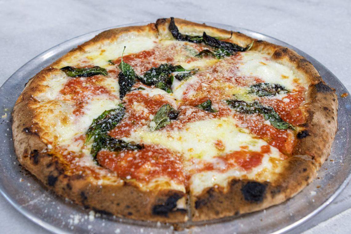 The Margherita Pizza at Capishe is made with red sauce, bufala mozzarella, fresh garlic, basil and extra virgin olive oil.