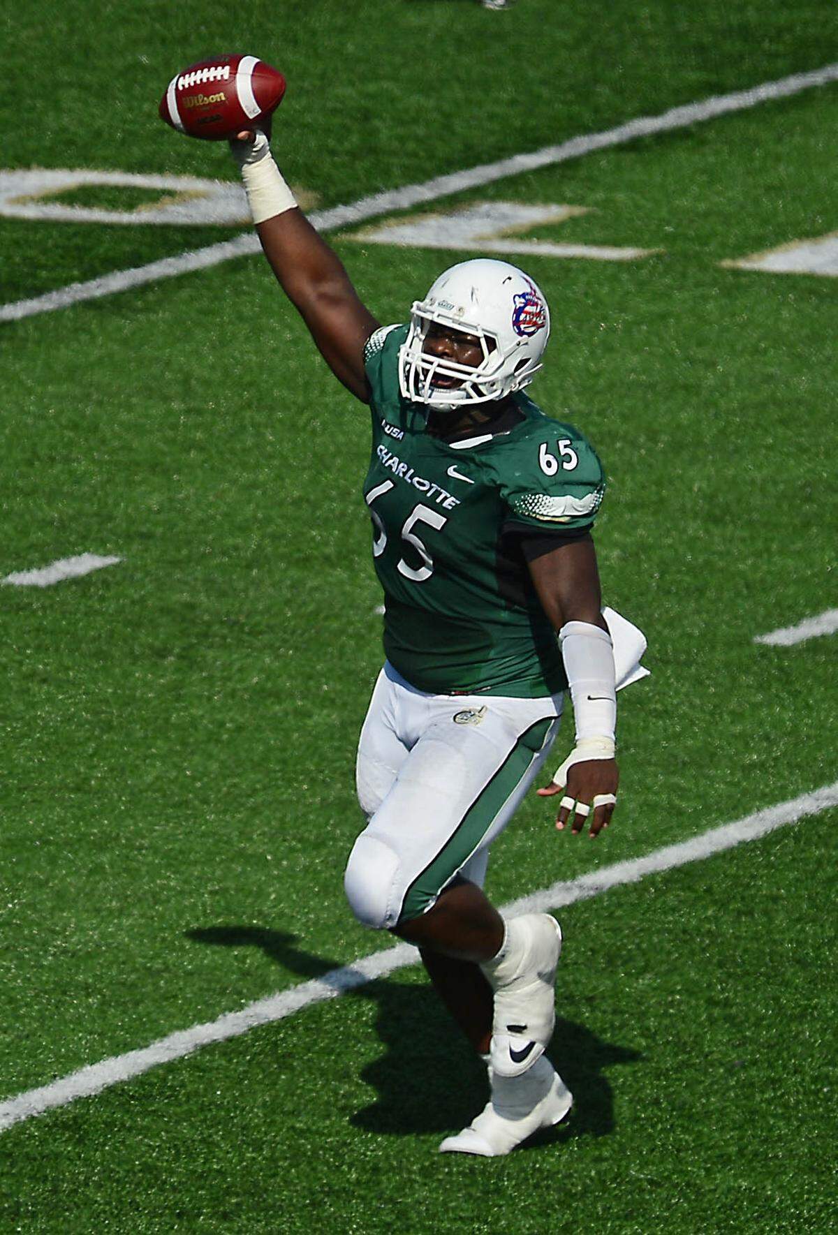 Larry Ogunjobi celebrates after recovering a fumble for the Charlotte 49ers. Ogunjobi is now playing for the NFL’s Cleveland Browns.