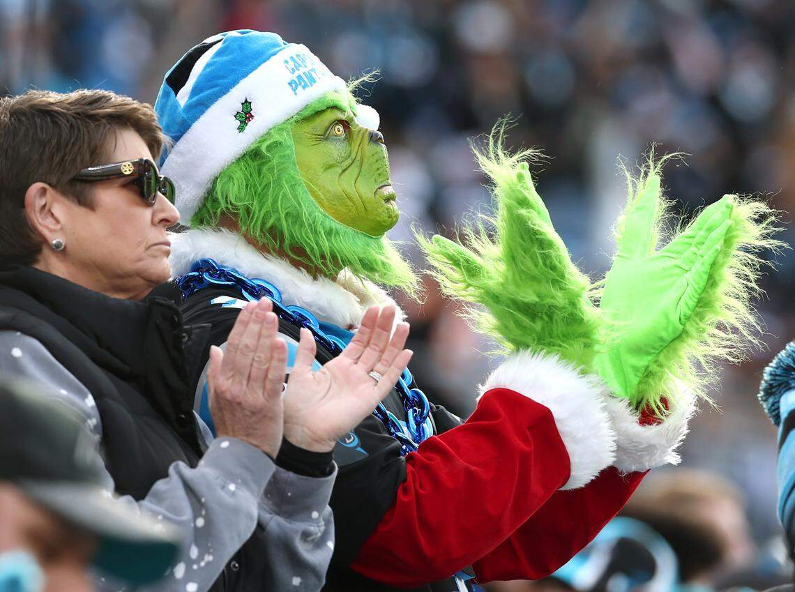 The Grinch celebrates the play of the Carolina Panthers during action against the Tampa Bay Buccaneers on Sunday at Bank of America Stadium in Charlotte. The Panthers defeated the Buccaneers 23-20.