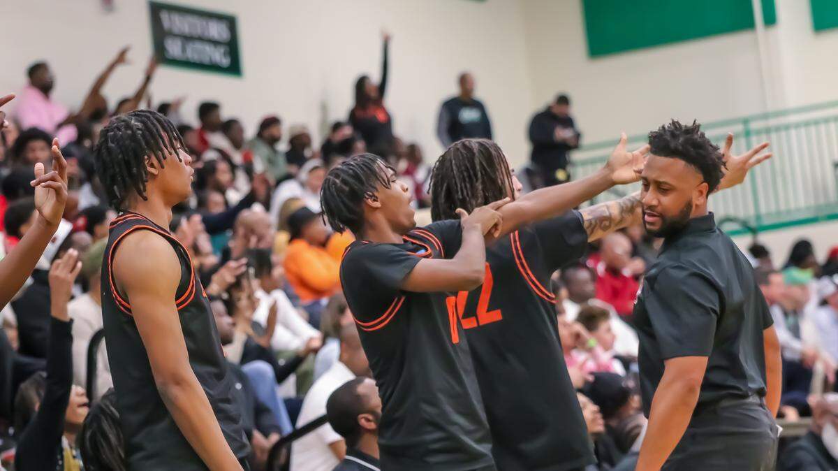 Chambers High players celebrate near the end of Friday’s 70-63 win at Myers Park in an NCHSAA 4A state quarterfinal basketball on March 7th, 2025 at Myers Park High School in Charlotte, North Carolina