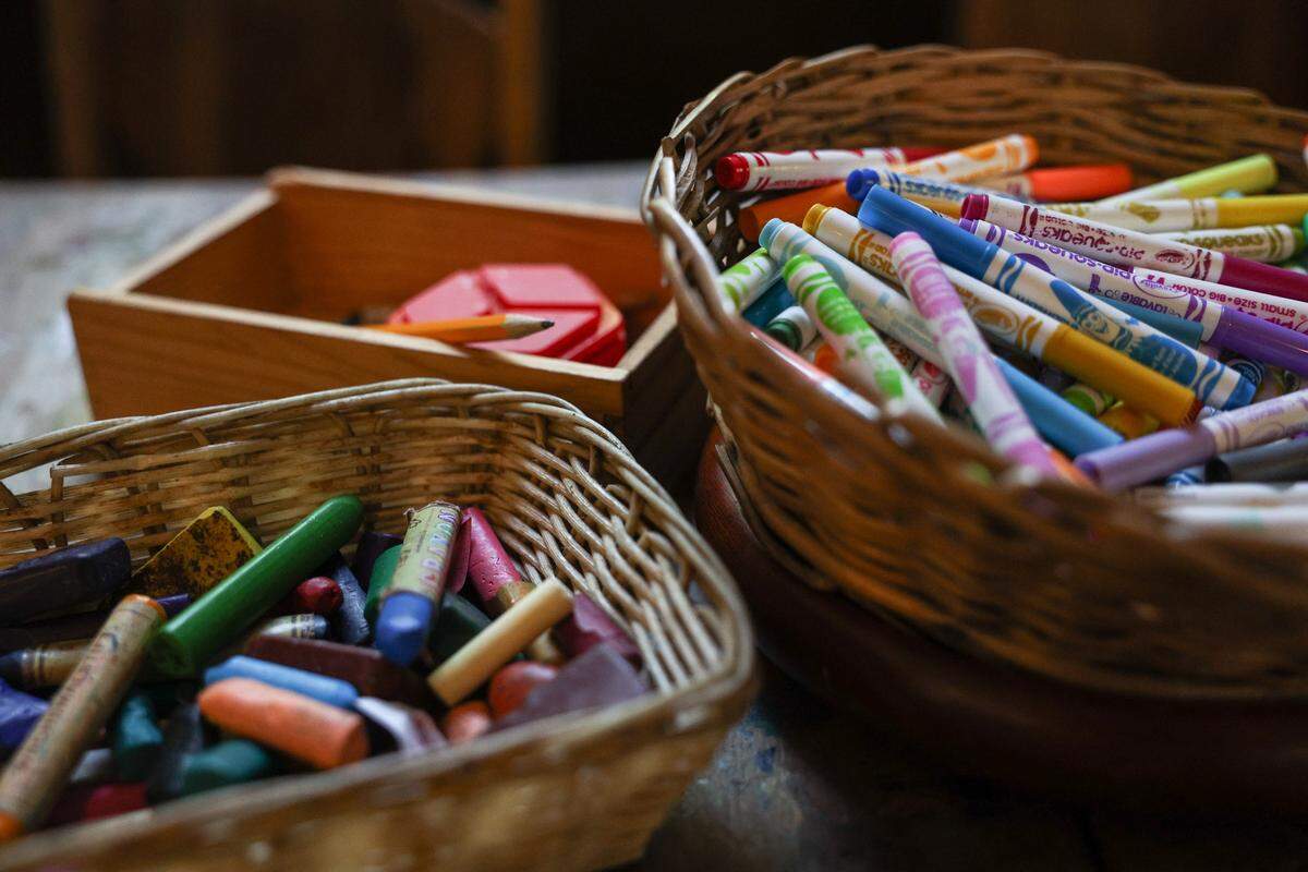 Crayons, markers and other art supplies sit in a classroom at ALC Mosaic, a private school located on Monroe Road in Charlotte.
