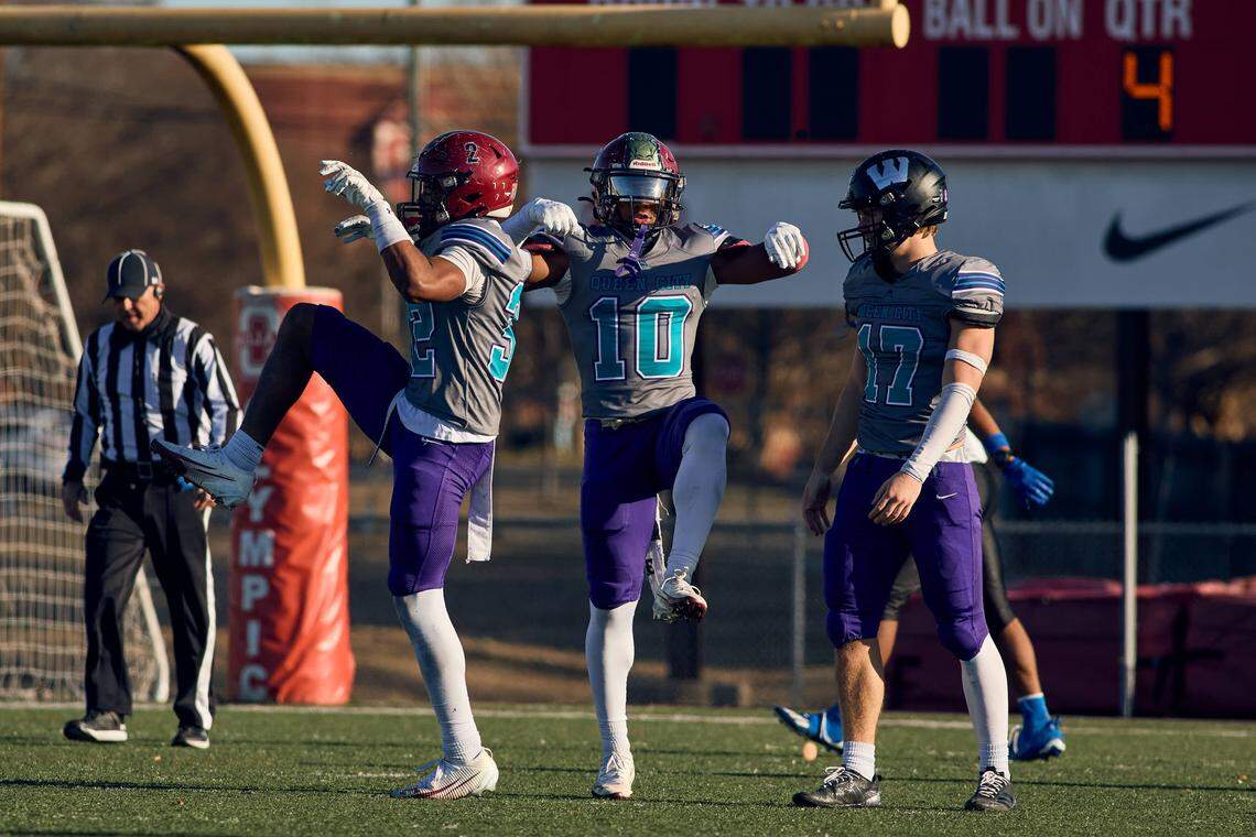 Mallard Creek LB Askia Mustafa (10) and Mallard Creek LB Deuce Miggett (32) celebrate a fourth down stop against the West Team in the Queen City Senior Bowl hosted at Olympic High School.