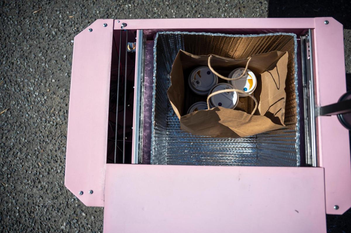 Tiny Mile’s pink robots that deliver coffee were unveiled in Plaza Midwood on Friday, April 1, 2022 in Charlotte, NC.