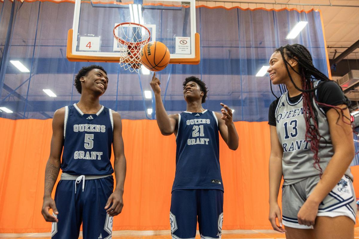 Queens Grant siblings, from left, Chucky Smith, Chase and Casey pose for a portrait at Carolina Courts in Indian Trail, N.C., on Wednesday, February 26, 2025.