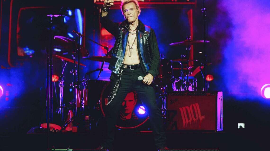 Review: Billy Idol turns back clock — and takes off shirt — for Charlotte fans