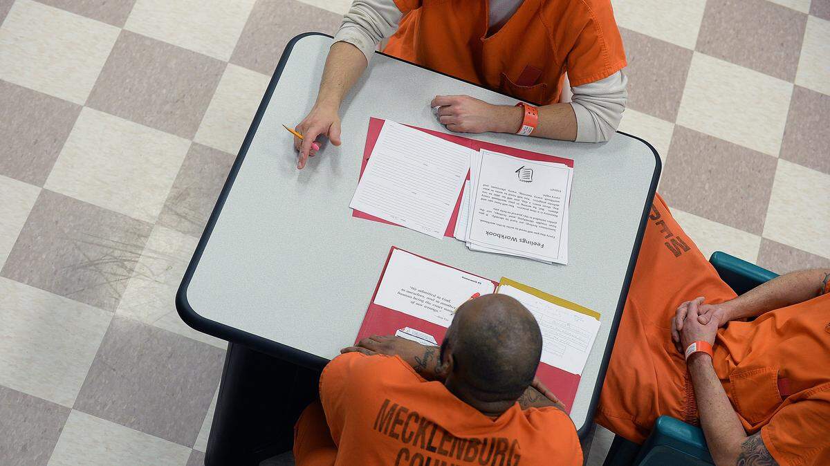 A group of inmates review information that was given to them about the treatment program at the Mecklenburg county jail. The biggest homeless shelter in Mecklenburg county is the county jail, and the sheriff believes his department should now be part of the ongoing effort to better coordinate housing programs for the homeless.