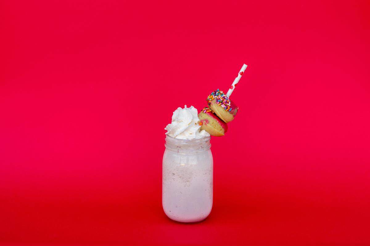 Honeysuckle Gelato’s Valentine’s Day shake for two comes with two mini doughnut holes from Suarez Bakery. 