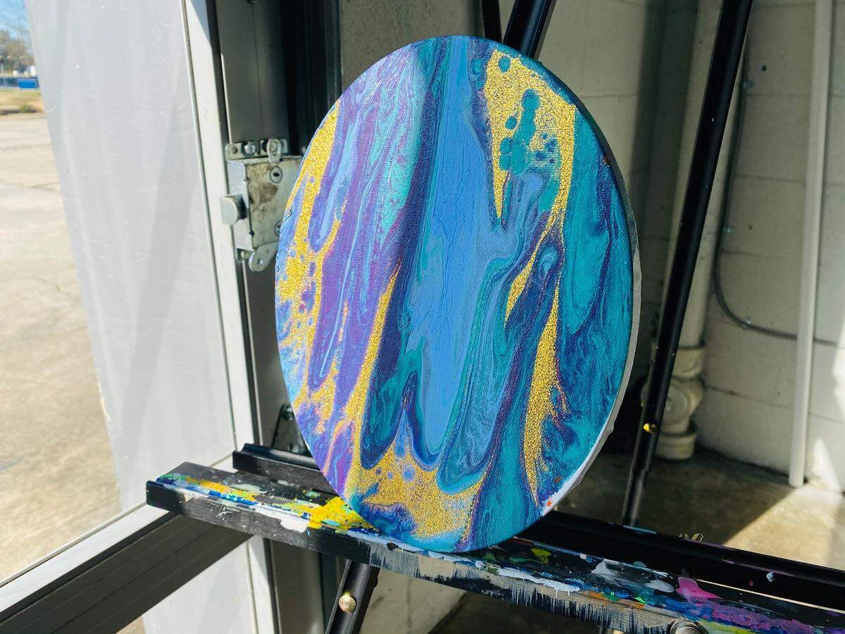 Artist Arelys Ripoll says this piece, called “Blue Beauty Tones,” represents how one can be sad, but still feel beautiful.