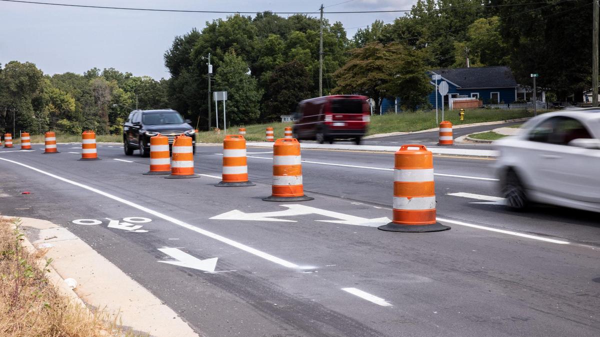 This road near Charlotte got new lanes months ago. Why do barrels still block drivers?