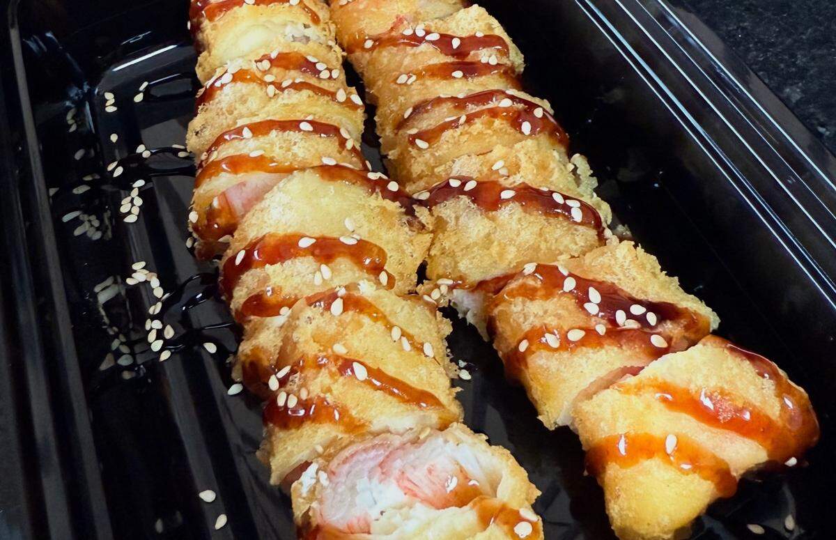 Tokyo Kitchen’s Japanese egg roll is a crab roll with cream cheese that’s deep fried in tempura batter and topped with eel sauce and sesame seeds.