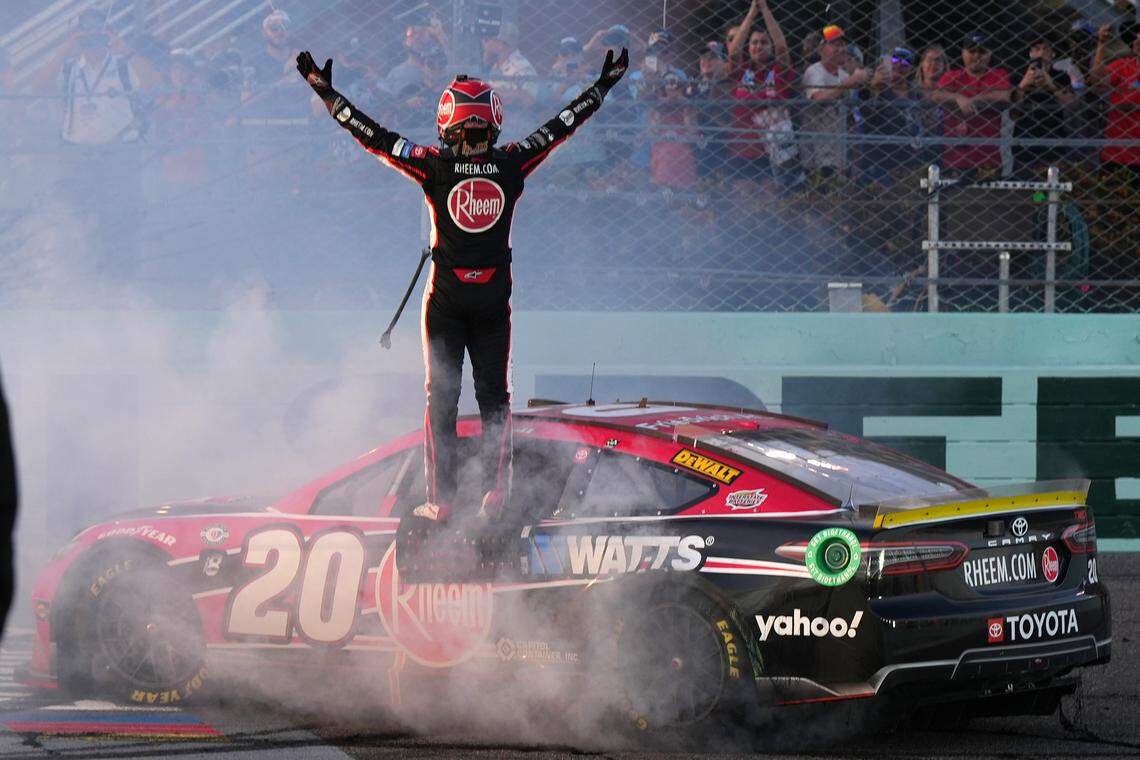 Oct 22, 2023; Homestead, Florida, USA; NASCAR Cup Series driver Christopher Bell (20) celebrates after winning the 4EVER 400 presented by Mobil 1 at Homestead-Miami Speedway.