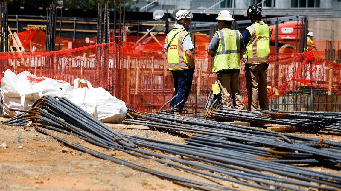 Candidates for North Carolina’s Labor Commissioner split about how they feel about potential new rules to protect the state’s workers from heat. Here, construction workers, who would be among the workers most impacted by new rules, are shown at the site of a new office tower in Charlotte.