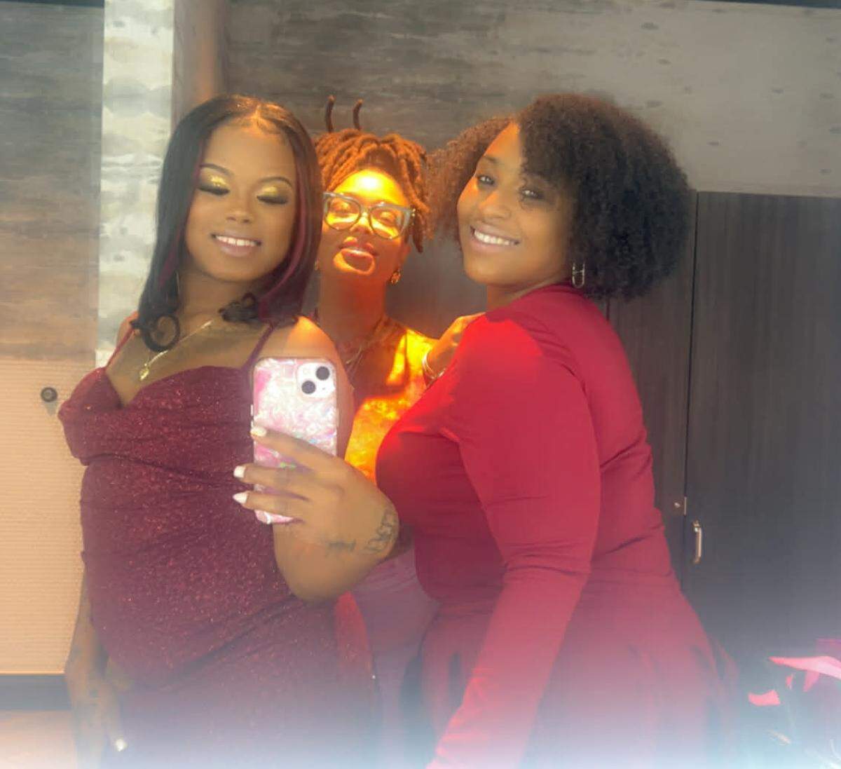 (From right) Frezja Matisse Baker, 31, with her friends Tyler and Tyneshia Johnson.
