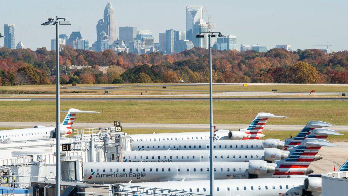 American Airlines planes sit at terminals at Charlotte Douglas International Airport on Tuesday, November 16, 2021 in Charlotte, NC. The airport ranked among the 10 worst in the U.S. for summer flight delays, study found.