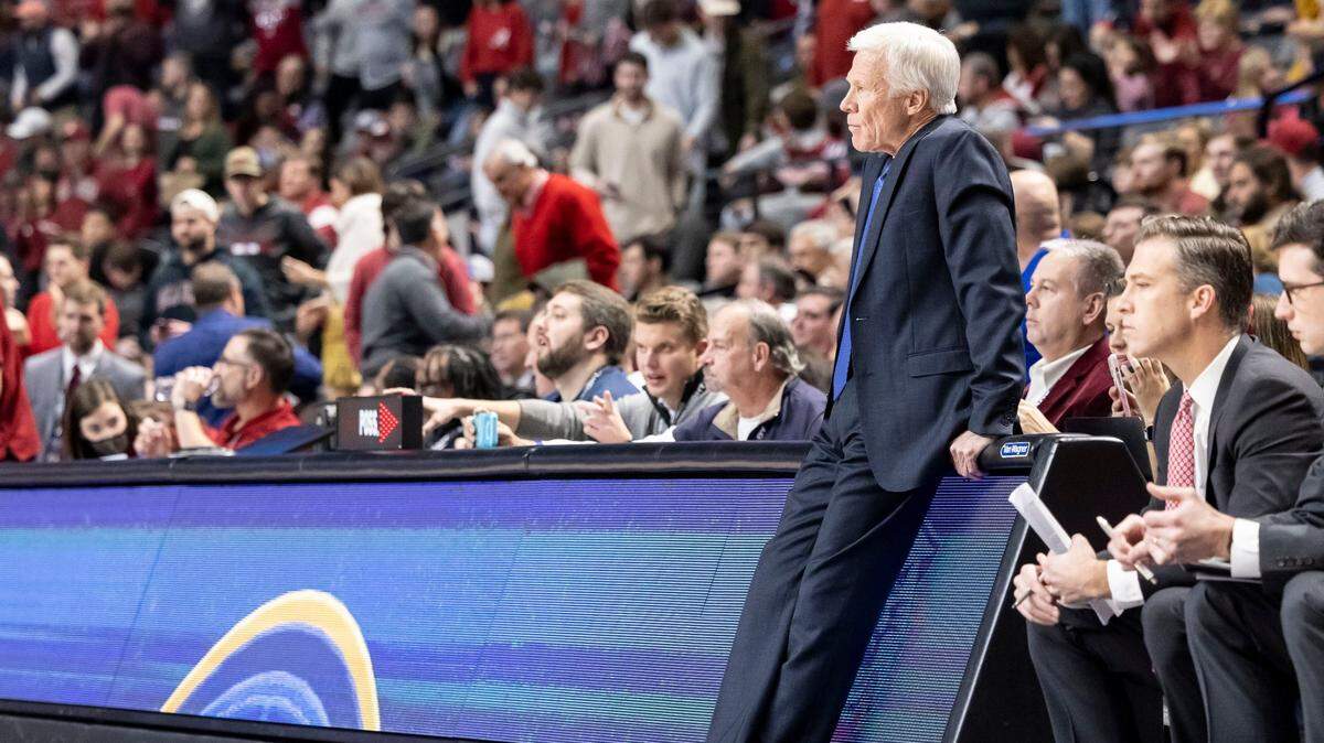 Davidson head coach Bob McKillop watches tip-off of the Wildcats’ game against Alabama last week. Davidson’s game scheduled for Thursday has been postponed.