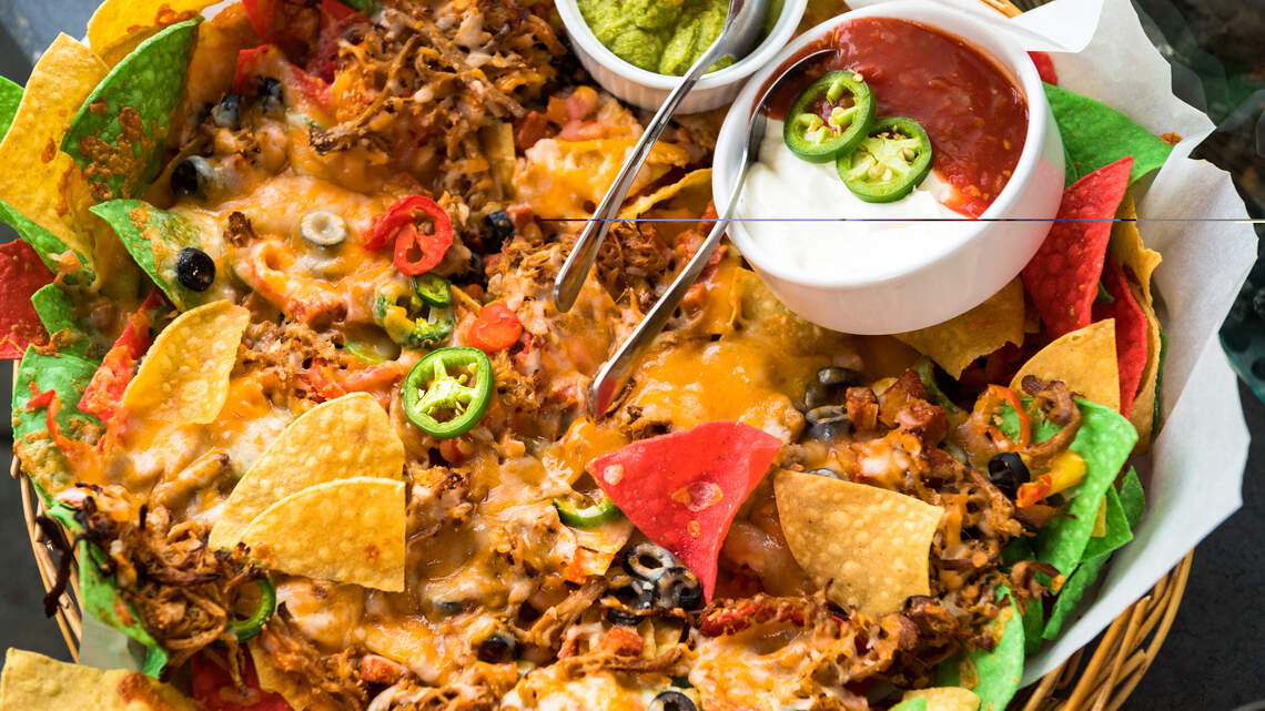 2 restaurants fight for top nachos title in Charlotte. Which one tempts you?