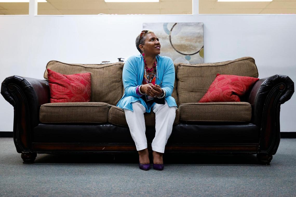 Camille Stephens speaks during a recent Parent Talk Therapy session at Plaza Road Academy. Stephens, who is the founder of a nonprofit that works with youths in the criminal justice system and their families, hosts the therapy session every Thursday.